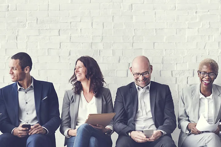 Group of happy people waiting to be hired